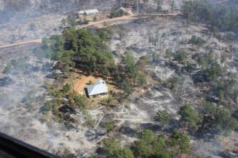 Structures are saved from the Fire. Photo Courtesy: Inciweb